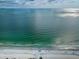 Stunning aerial view of a pristine beach and clear ocean waters at 19725 Gulf Blvd # 46, Indian Shores, FL 33785