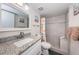 Updated bathroom with walk-in shower and granite vanity at 19725 Gulf Blvd # 46, Indian Shores, FL 33785