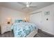 Bright bedroom with a queen bed and plenty of closet space at 19725 Gulf Blvd # 46, Indian Shores, FL 33785