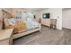 Bedroom with king-size bed and flat-screen TV at 19725 Gulf Blvd # 46, Indian Shores, FL 33785