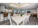Open concept dining room with kitchen and living room views at 19725 Gulf Blvd # 46, Indian Shores, FL 33785