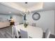 Open concept dining room with view of living room and kitchen at 19725 Gulf Blvd # 46, Indian Shores, FL 33785