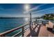 Community dock with seating and life preserver at 19725 Gulf Blvd # 46, Indian Shores, FL 33785