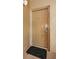 Condo entry door with a welcome mat at 19725 Gulf Blvd # 46, Indian Shores, FL 33785