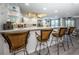 Kitchen with breakfast bar seating and granite countertops at 19725 Gulf Blvd # 46, Indian Shores, FL 33785