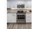 Modern kitchen with stainless steel appliances and granite countertops at 19725 Gulf Blvd # 46, Indian Shores, FL 33785