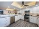 Open concept kitchen with stainless steel appliances and granite countertops at 19725 Gulf Blvd # 46, Indian Shores, FL 33785