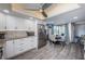 Updated kitchen with white cabinets and stainless steel appliances at 19725 Gulf Blvd # 46, Indian Shores, FL 33785