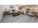 Living room with a large sofa and coffee table at 19725 Gulf Blvd # 46, Indian Shores, FL 33785