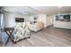 Living room features a comfortable sofa and a large-screen TV at 19725 Gulf Blvd # 46, Indian Shores, FL 33785
