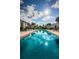 Relaxing community pool reflecting the sky at 19725 Gulf Blvd # 46, Indian Shores, FL 33785