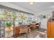 Sunlit home office features built-in workspace and ample natural light at 200 Glennes Ln # 206, Dunedin, FL 34698