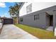Modern home with attached garage and concrete driveway at 2066 San Marino N Way, Clearwater, FL 33763