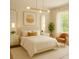 Bright bedroom with neutral tones, featuring a large window and stylish decor at 2066 San Marino N Way, Clearwater, FL 33763