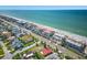 Aerial view showing beachfront location and proximity to amenities at 2900 Gulf Blvd # 212, Belleair Beach, FL 33786