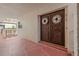 Condo entry with double doors and decorative wreath at 2900 Gulf Blvd # 212, Belleair Beach, FL 33786