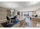Open living and dining area with coastal decor at 2900 Gulf Blvd # 212, Belleair Beach, FL 33786