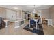 Open concept living, dining, and kitchen area at 2900 Gulf Blvd # 212, Belleair Beach, FL 33786