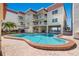 Inviting kidney-shaped community swimming pool at 2900 Gulf Blvd # 212, Belleair Beach, FL 33786
