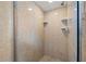 Clean shower with tiled walls and built-in shelves at 2900 Gulf Blvd # 212, Belleair Beach, FL 33786