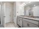 Elegant bathroom with granite countertops and double sinks at 2919 Grand Kemerton Pl, Tampa, FL 33618