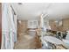 Spa-like bathroom with a soaking tub, double vanity, and walk-in shower at 3400 Gulf Blvd # 105, Belleair Beach, FL 33786