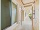 Condo hallway with doors to individual units at 3400 Gulf Blvd # 105, Belleair Beach, FL 33786