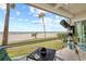 Enjoy breathtaking ocean views from this relaxing patio at 3400 Gulf Blvd # 105, Belleair Beach, FL 33786