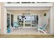 Relaxing patio with ocean views and comfortable seating at 3400 Gulf Blvd # 105, Belleair Beach, FL 33786