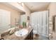Simple bathroom with single vanity and tub shower at 5025 Cactus Needle Ln, Wesley Chapel, FL 33544