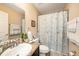 Clean bathroom with tub shower combo and granite vanity at 5025 Cactus Needle Ln, Wesley Chapel, FL 33544