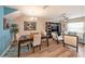Dining area with a table and chairs near the living room at 5025 Cactus Needle Ln, Wesley Chapel, FL 33544