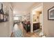 Hallway with access to bathroom and other rooms at 5025 Cactus Needle Ln, Wesley Chapel, FL 33544