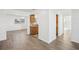 Open floor plan showing kitchen, dining, and living areas at 5430 Palm Crest N Ct, Pinellas Park, FL 33782