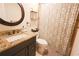 Clean bathroom with granite countertop and shower at 7838 Avenal Loop, New Port Richey, FL 34655