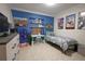 Fun bedroom with a bed and dedicated study area at 7838 Avenal Loop, New Port Richey, FL 34655
