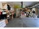 Organized garage with overhead storage at 7838 Avenal Loop, New Port Richey, FL 34655