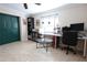 Home office with desk, chair, and ample storage at 7838 Avenal Loop, New Port Richey, FL 34655