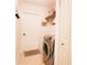 Bright laundry room with washer, dryer, and ample storage at 7838 Avenal Loop, New Port Richey, FL 34655