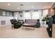 Spacious living room with a fireplace and comfortable seating at 7838 Avenal Loop, New Port Richey, FL 34655