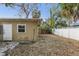 Small backyard with shed and wooden fence at 2901 Dr Martin Luther King Jr S St, St Petersburg, FL 33705