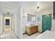 Small kitchen with wood cabinets and double sink at 2901 Dr Martin Luther King Jr S St, St Petersburg, FL 33705