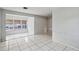 Living room with tiled floor and large window at 2901 Dr Martin Luther King Jr S St, St Petersburg, FL 33705