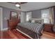 Spacious bedroom featuring hardwood floors, a ceiling fan, and classic furnishings at 165 21St Ne Ave, St Petersburg, FL 33704