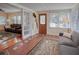 Inviting entryway with tiled floor, decorative front door, and open access to the living room at 165 21St Ne Ave, St Petersburg, FL 33704