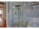 Large walk-in shower with marble tile and glass enclosure at 165 21St Ne Ave, St Petersburg, FL 33704