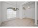 Spacious dining room with tile floors and natural light at 2035 Larissa Ct, Trinity, FL 34655