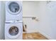 Laundry area with stackable Samsung washer and dryer at 22926 Sonoma Ln, Lutz, FL 33549