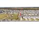 Aerial view showing house location in community near park at 33157 Rosewood Bark Way, Wesley Chapel, FL 33545