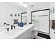 Modern bathroom with double vanity and walk-in shower at 33157 Rosewood Bark Way, Wesley Chapel, FL 33545